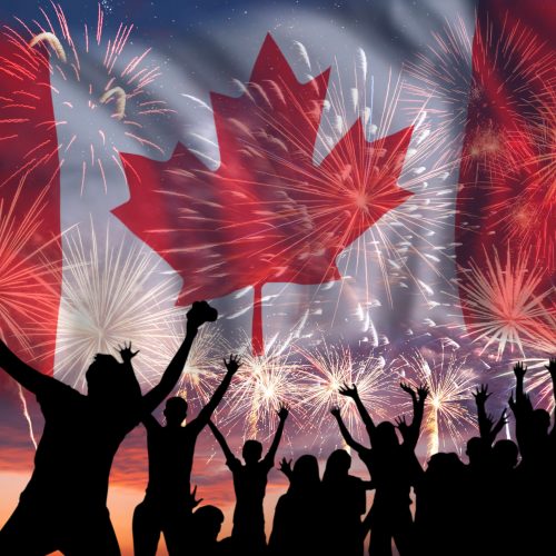 People looks holiday fireworks on independence day, flag of Canada in sky, background and banner